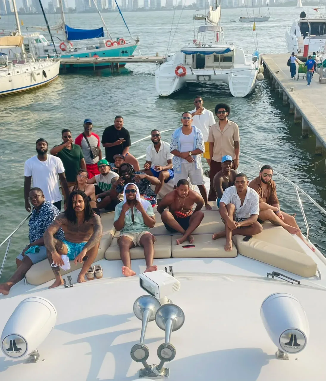 A large group of guests aboard a private yacht at the Cartagena marina